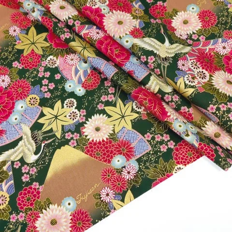 Dark green Japanese fabric with floral motif, birds, fans and Mount Fuji