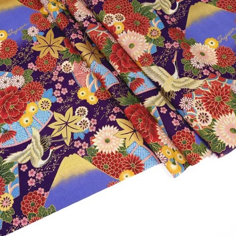 Purple Japanese fabric with floral motif, birds, fans and Mount Fuji